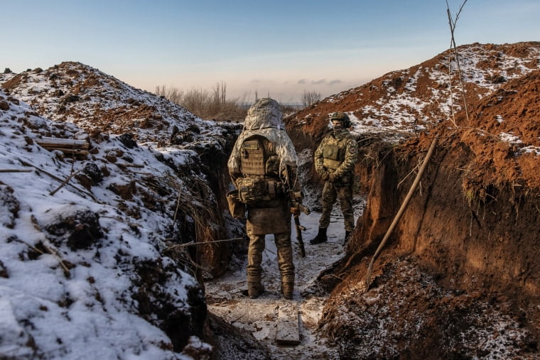 Ukrainian soldiers of the 41st brigade stand in a trench near the frontline, outside Kupiansk, in the Kharkiv region, on Jan. 23, 2024,Ukraine in the war.