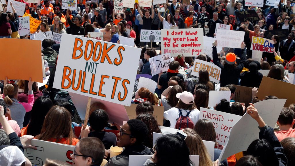 Hundreds of students gather at the State Capitol in St. Paul, Minn., on Friday to protest gun violence, part of a national high school walkout on the 19th anniversary of the Columbine High School shooting.
