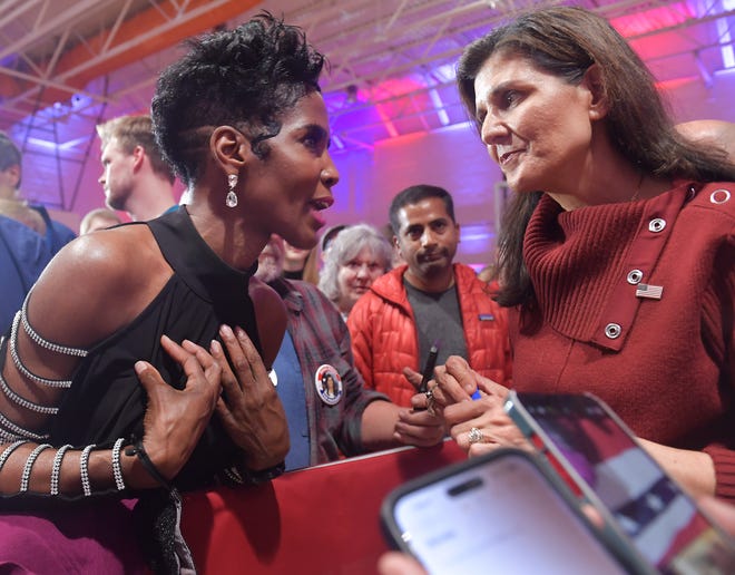 Nikki Haley, GOP presidential candidate, campaigns at Mauldin High School in Mauldin, S.C., on Jan. 27, 2024. Stephania Priester of Taylors, left, takes a moment to talk to Nikki Haley about current issues.