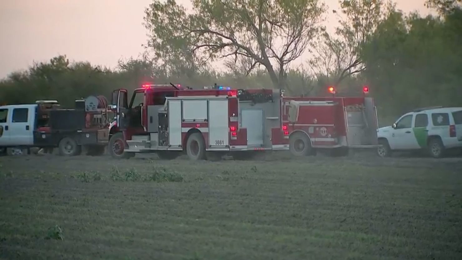 Border Patrol and first responders on the scene of a helicopter crash in Starr County, Texas, on Friday, March 8.