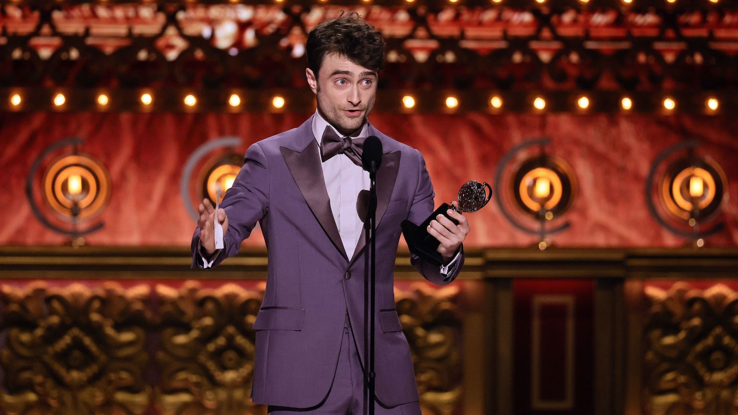 Daniel Radcliffe accepting the Tony for best performance by an actor in a featured role in a musical at the 2024 Tony Awards in New York City.