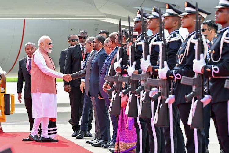 PM lands in Maldives, warmly greets Muizzu