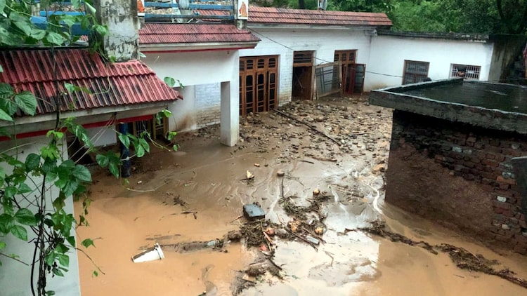 Debris and mud accumulated in a residential area following a cloudburst, in Kathua, Sunday, Aug. 17, 2025