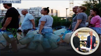 People wait in line to collect water delivered by a tank truck in Russian-controlled Donetsk city People wait in line to collect water delivered by a tank truck in Russian-controlled Donetsk city