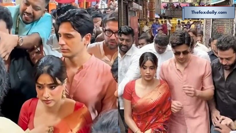 Sidharth Malhotra and Janhvi Kapoor making their way through the massive crowd