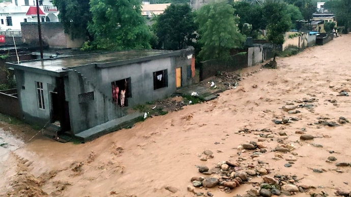Damaged road following a cloudburst, in Kathua, Sunday, Aug. 17, 2025