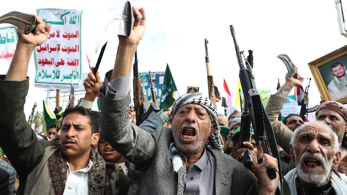 Houthi supporters chant slogans during a weekly anti-Israel rally in Sanaa.