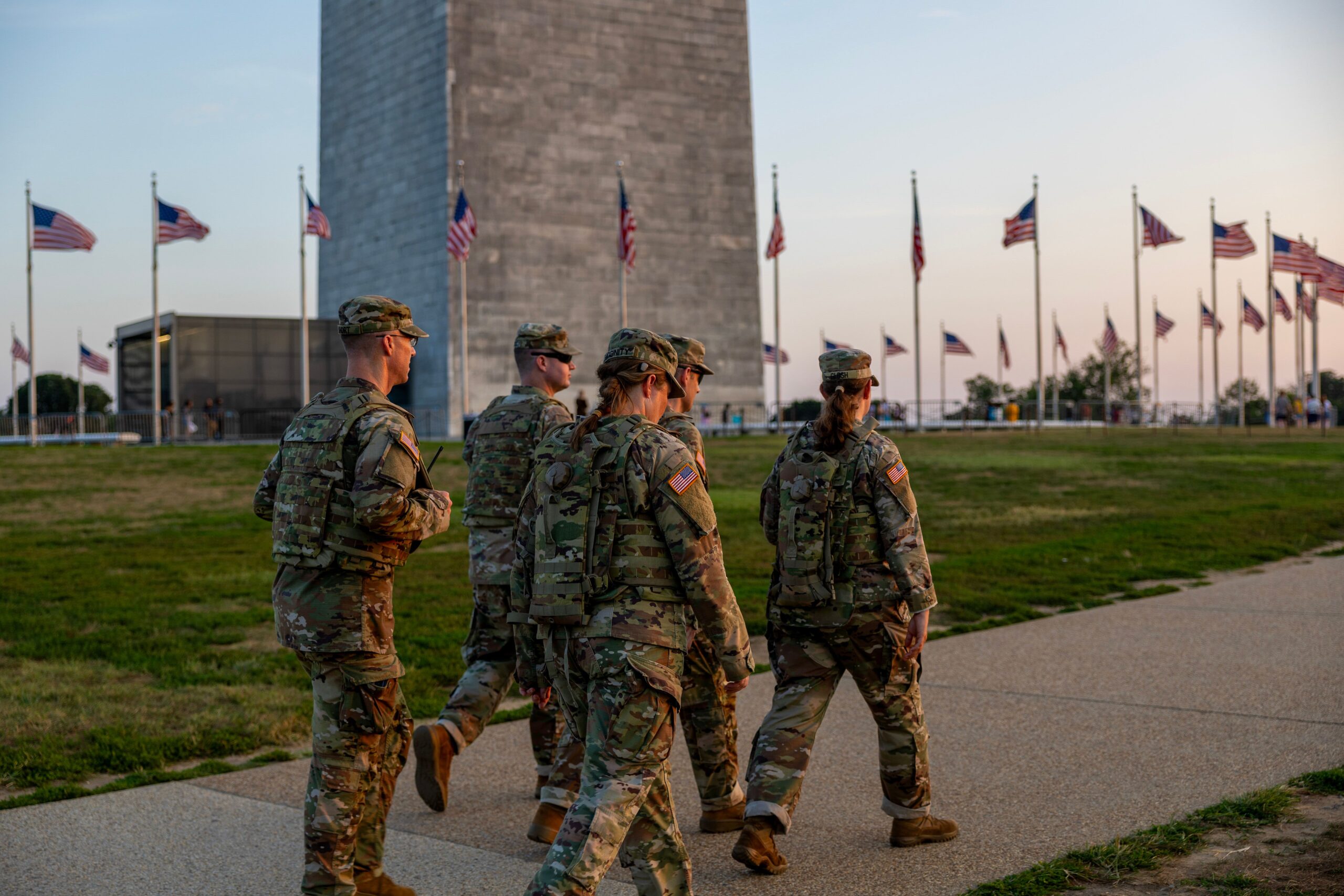 Members of the National Guard patrol the Washington Monument on August 16, 2025 in Washington, DC. An increased presence of law enforcement has been seen throughout the nation's capital since U.S. President Donald Trump announced plans to deploy federal officers and the U.S. National Guard