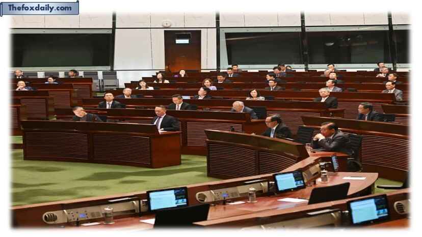 Lawmakers vote in the Legislative Council Chamber for a decision on whether to grant limited rights to same-sex couples in Hong Kong.
