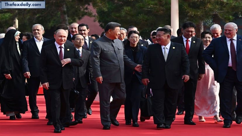 Russian President Vladimir Putin, left, Chinese President Xi Jinping, center, and North Korean leader Kim Jong Un, right, attend a military parade in Beijing, on Wednesday