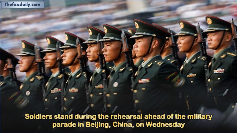 Soldiers stand during the rehearsal ahead of the military parade in Beijing, China, on Wednesday