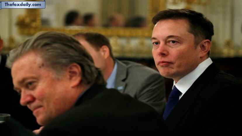 tesla CEO Elon Musk (right) sits beside Trump ally Steve Bannon (left)