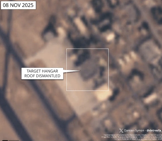 the damaged hangar is still undergoing phased dismantling, likely to inspect internal structural damage before reconstruction can begin