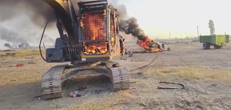 An ethanol plant protest in Rajasthan descends into violence, with cars set on fire and the internet cut off.
