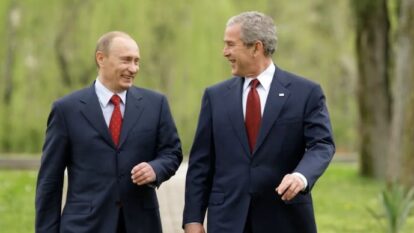 Russia's President Vladimir Putin and US President George W Bush walk together on the grounds of the Bocharov Ruchey presidential summer residence on the Black Sea in Sochi, Russia, on April 6, 2008.