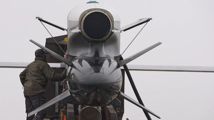 Workers and military inspect Ukrainian Fire Point’s Flamingo missiles during handover to the military in an undisclosed location in Ukraine.