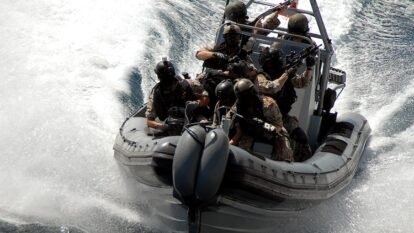 Danish sailors training with USS Vella Gulf during counter-piracy operations in the Gulf of Aden, in 2009.