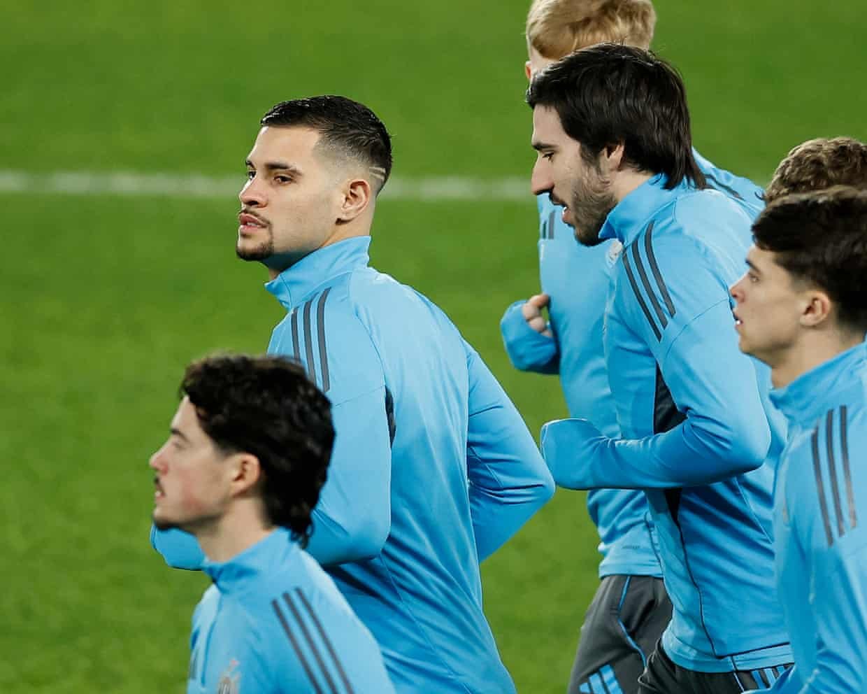 Chelsea's Cole Palmer (second left) looks on during a training session.