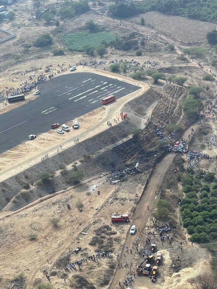 Aerial view of the crash site near Runway 11 at Baramati airport