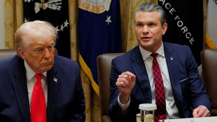 US Secretary of Defense Pete Hegseth speaks during a cabinet meeting with Donald Trump.