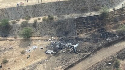 Aerial view of the crash site near Runway 11 at Baramati airport