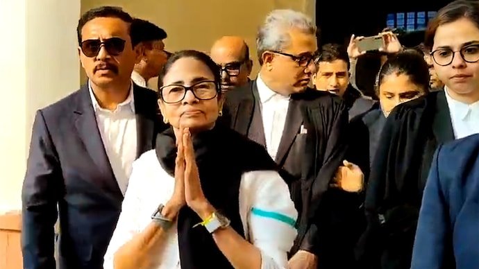 Mamata greets other lawyers with folded hands inside the Supreme Court premises.