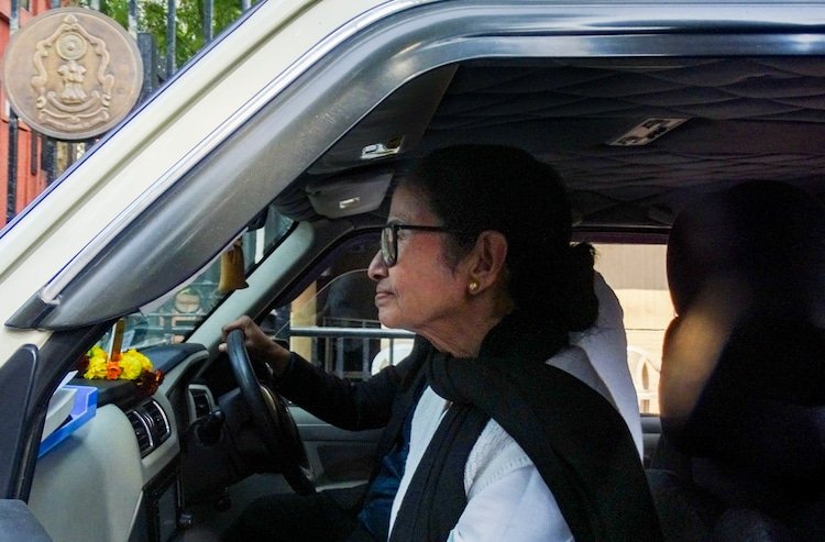 Mamata greets other lawyers with folded hands inside the Supreme Court premises.