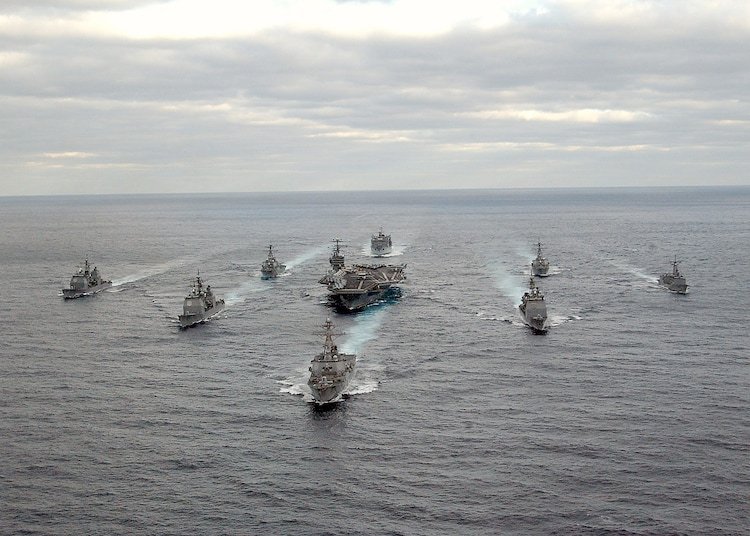 Aircraft carriers and their battle groups, like the USS Abraham Lincoln pictured here enable navies to project power and influence across the world.