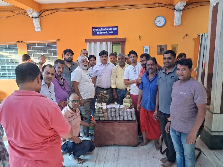 Inside the contribution box at the Jharkhand shrine are Pakistani rupees, US dollars, and Nepali currencies