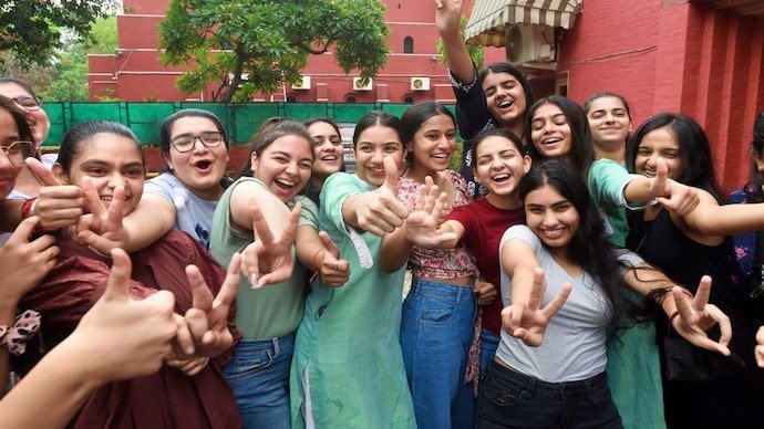 Girls Students celebrate their success after 12th exam results