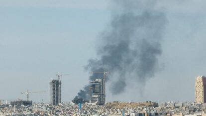 Smoke rises above the city, amid the US-Israeli conflict with Iran, in Riyadh, Saudi Arabia.