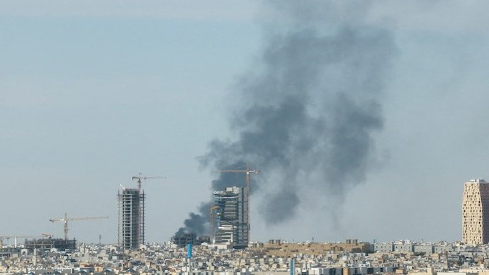 Smoke rises above the city, amid the US-Israeli conflict with Iran, in Riyadh, Saudi Arabia.