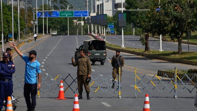 Pakistan capital Islamabad placed under lockdown.
