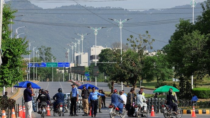 Police divert traffic on the road leading to Serena Hotel, a possible venue for second US and Iran talks in Islamabad.