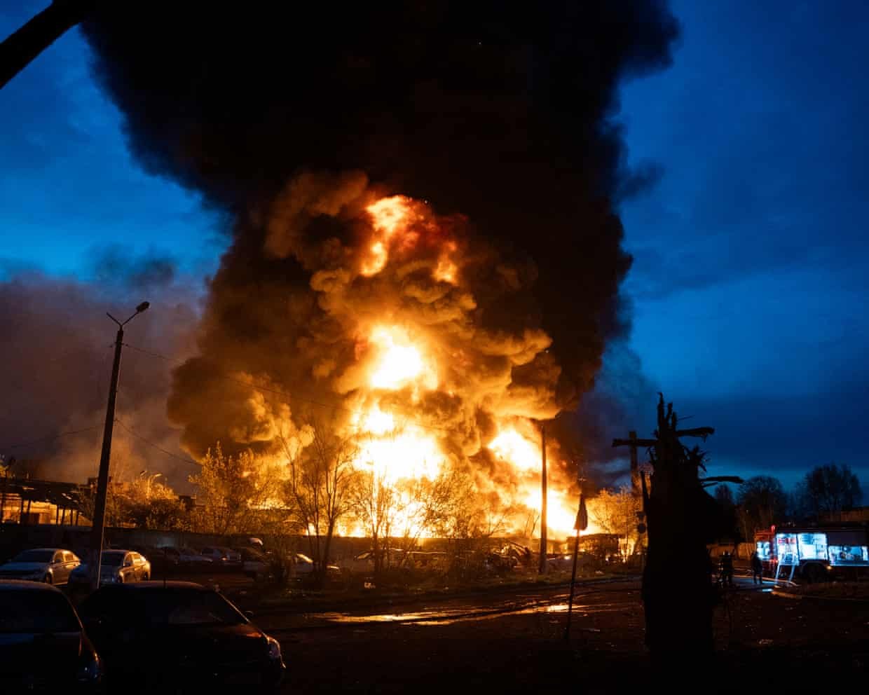 Fire burns at recycling site in Kyiv following Russian strike