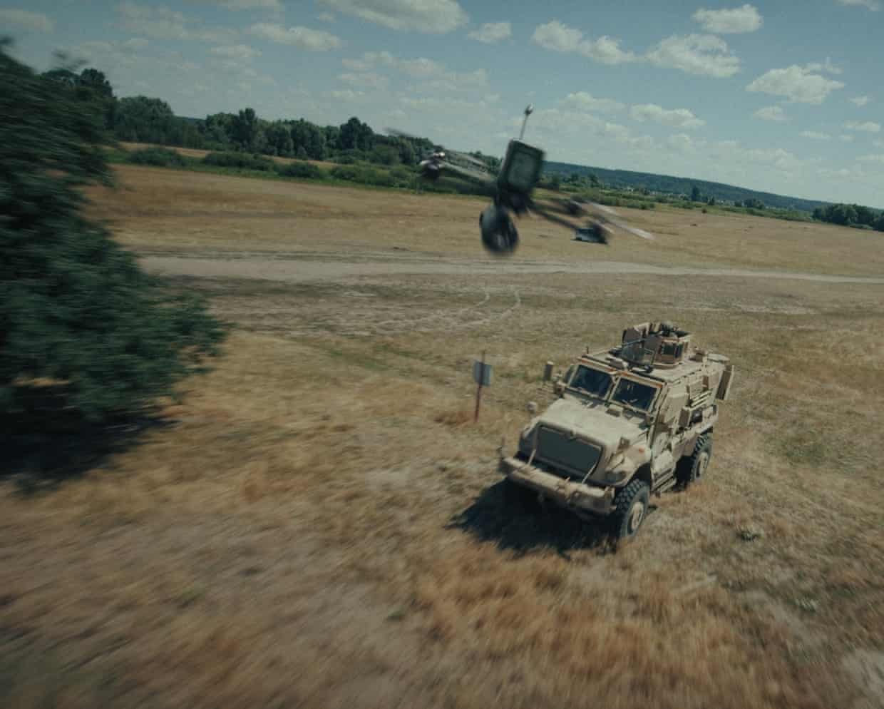Drone flying over a US-made military vehicle.