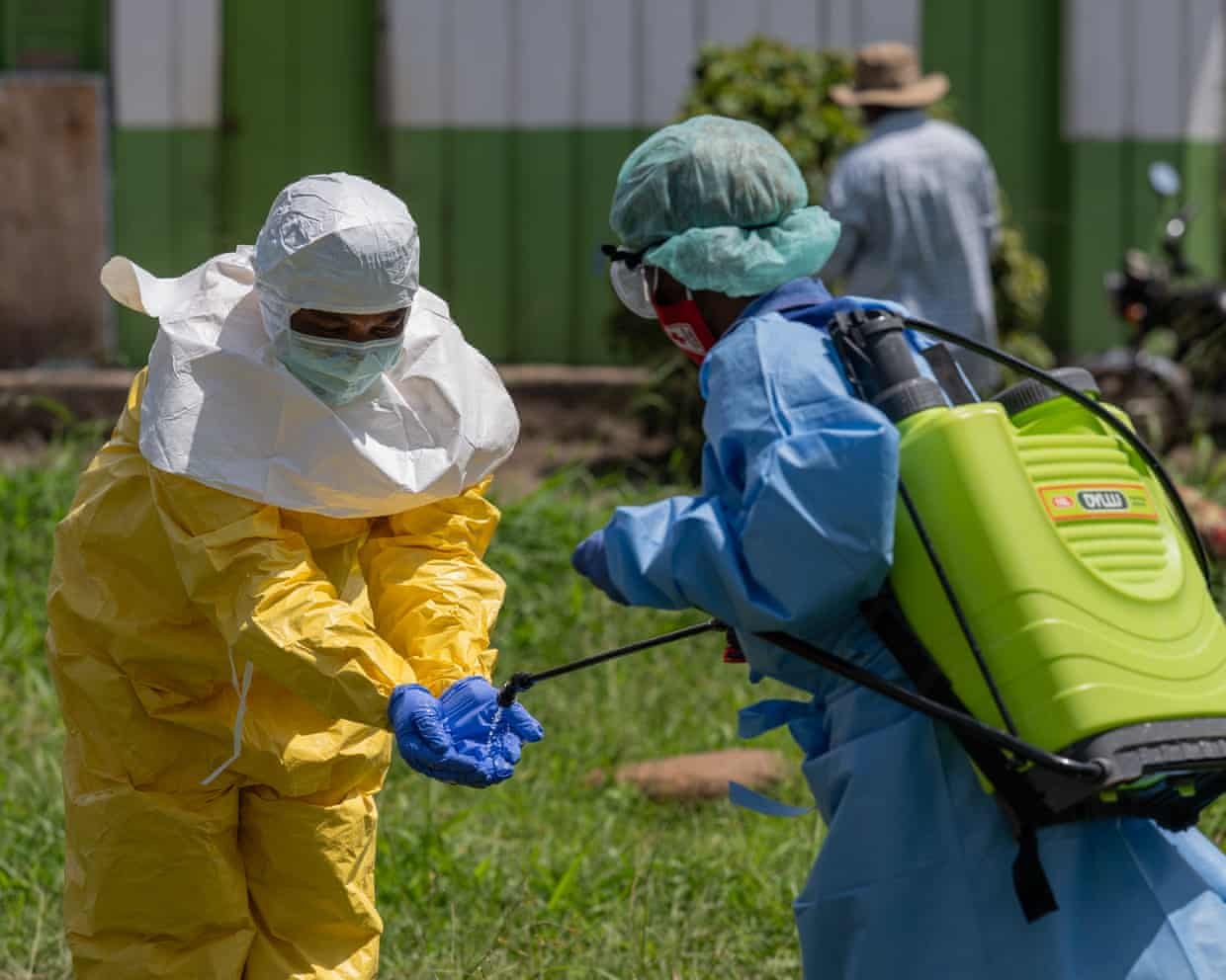 A Red Cross worker disinfects after contact with the bodies of people who died of Ebola in Rwampara, Ituri province, DRC, on 20 May 2026.