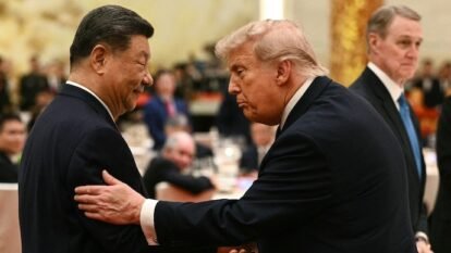 China's President Xi Jinping (L) looks at US President Donald Trump as they attend a state banquet at the Great Hall of the People in Beijing. China's President Xi Jinping (L) looks at US President Donald Trump as they attend a state banquet at the Great Hall of the People in Beijing.