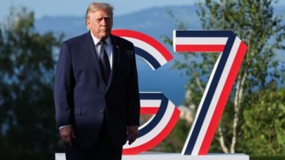 US President Donald Trump arrives for the official greeting during the G7 summit, in Evian, eastern France, on June 15
