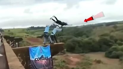 Videos recorded at the scene appear to show staff escorting her to the edge of the bridge before releasing her. Videos recorded at the scene appear to show staff escorting her to the edge of the bridge before releasing her.