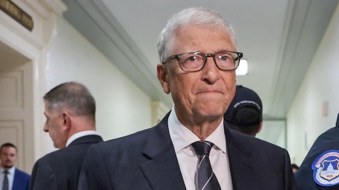 Bill Gates speaks to the media as he arrives for a closed door interview before the House Oversight Committee