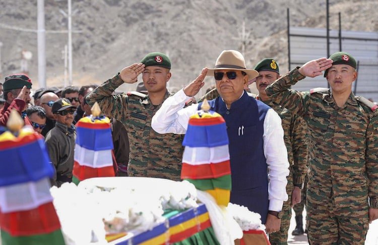 Ladakh Lieutenant Governor Vinai Kumar Saxena pays his respects to Colonel Sonam Wangchuk at his funeral, accompanied by soldiers of the Ladakh Scouts offering a formal military salute