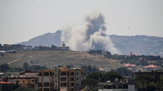 Smoke billows from southern Lebanon, following Israeli strikes, as seen from Nabatieh, Lebanon, June 8, 2026.