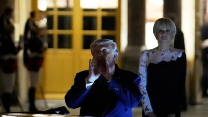 “It’s signed,” Donald Trump shouted to reporters after dinner at the Palace of Versailles on Wednesday, as French First Lady Brigitte Macron looked on during the historic moment.