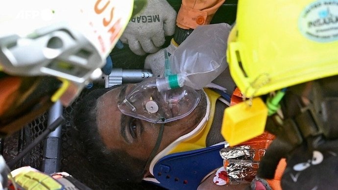 Camera captures Hernan Gil Flores trapped beneath earthquake rubble