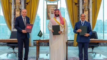 From left, Turkish President Recep Tayyip Erdogan, Saudi Crown Prince Mohammed bin Salman and Pakistani Prime Minister Shehbaz Sharif pose after signing a trilateral defence agreement in Mecca, Saudi Arabia, Friday, Aug. 7, 2026.
