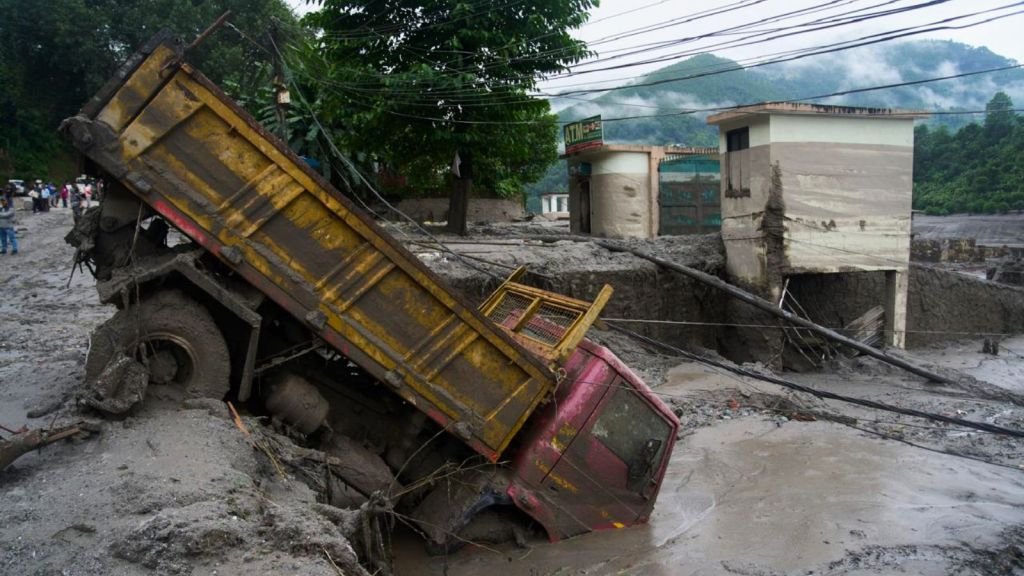 Nepal lake formed after flash flood breaks banks, water level rising