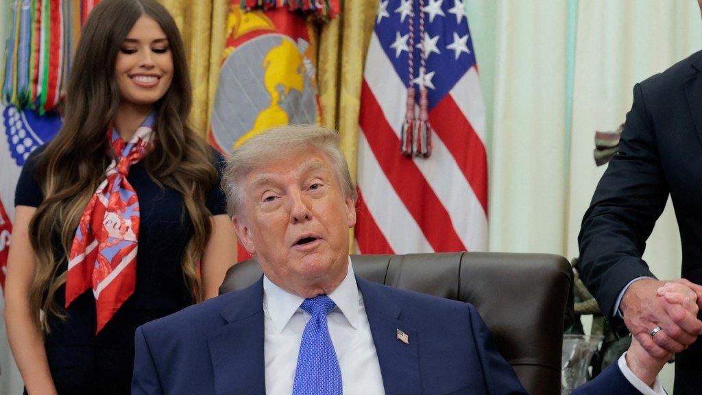 Jayme Leagh Franklin was standing behind Donald Trump on Monday as he signed executive orders.