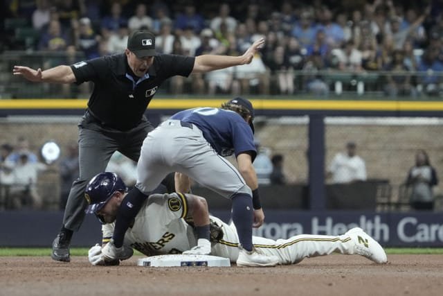 Jake Bauers-Cal Raleigh Collision Sparks MLB Debate in Brewers’ 22-0 Rout