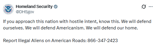 The poster carried the message, “America for Americans. Get off our roads; you don
